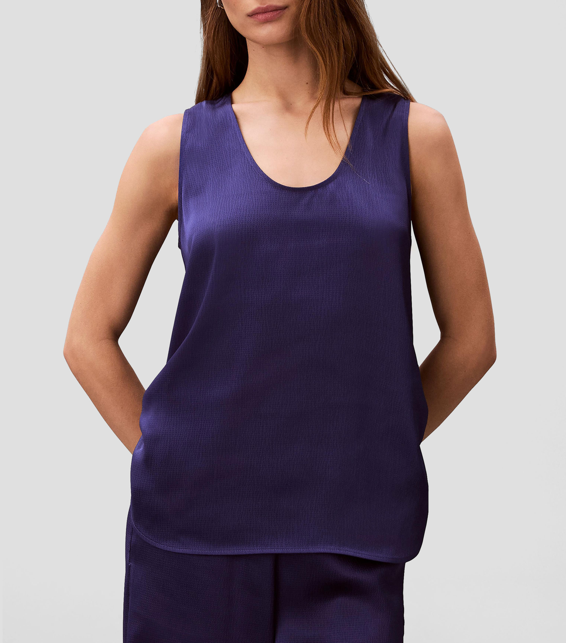 Blusa de diseño sólido sin mangas Mujer
